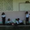 Schoolkids in front of their school